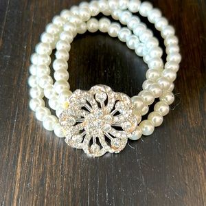 This beautiful bracelet has never been worn. It would be a great piece to buy.